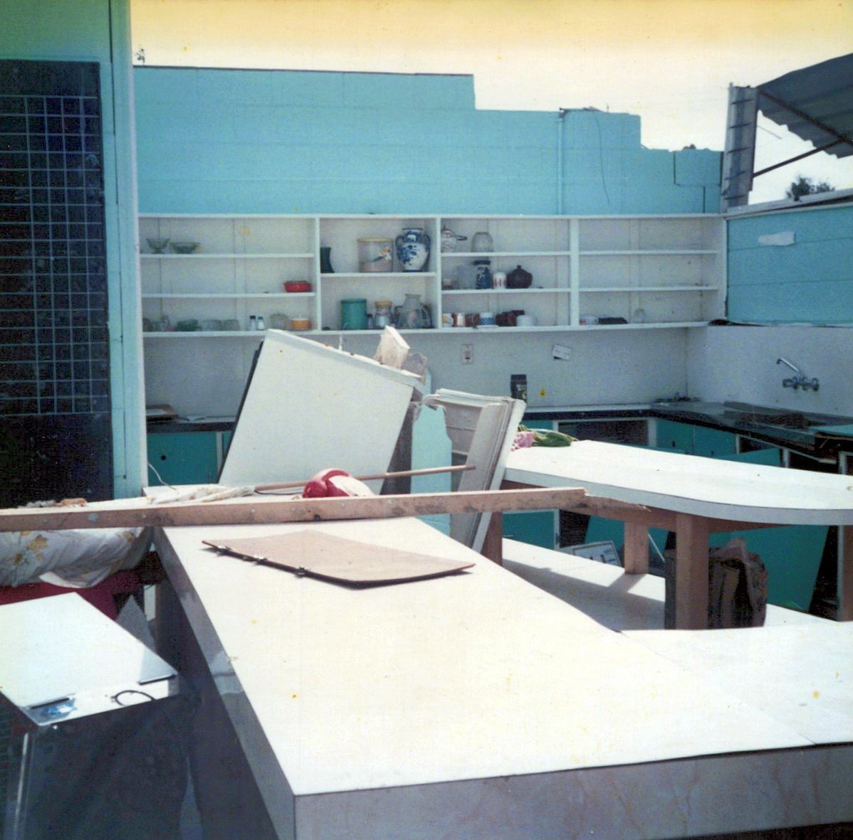 Inside the wrecked clubhouse kitchen after the cyclone.